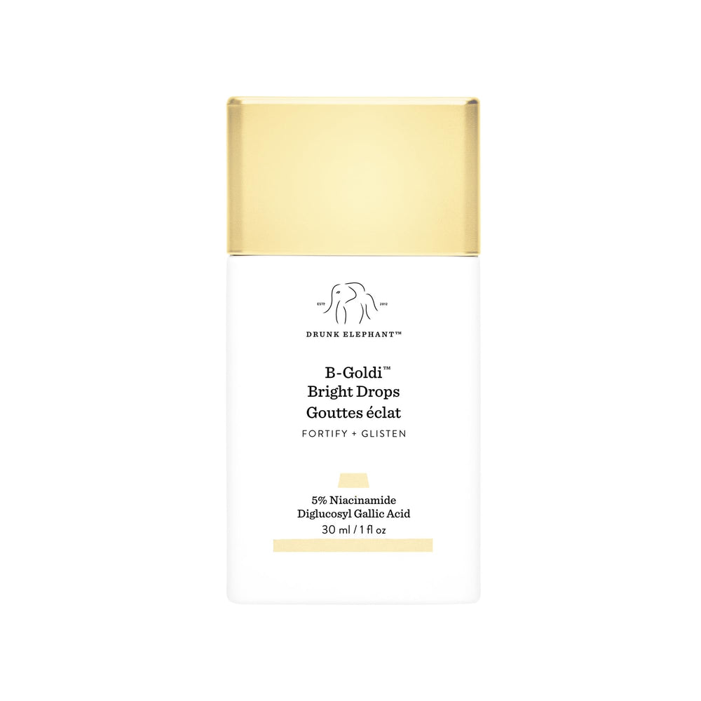 Drunk Elephant B-Goldi Bright Drops sur la bouteille, éclat doré subtil et uniforme.