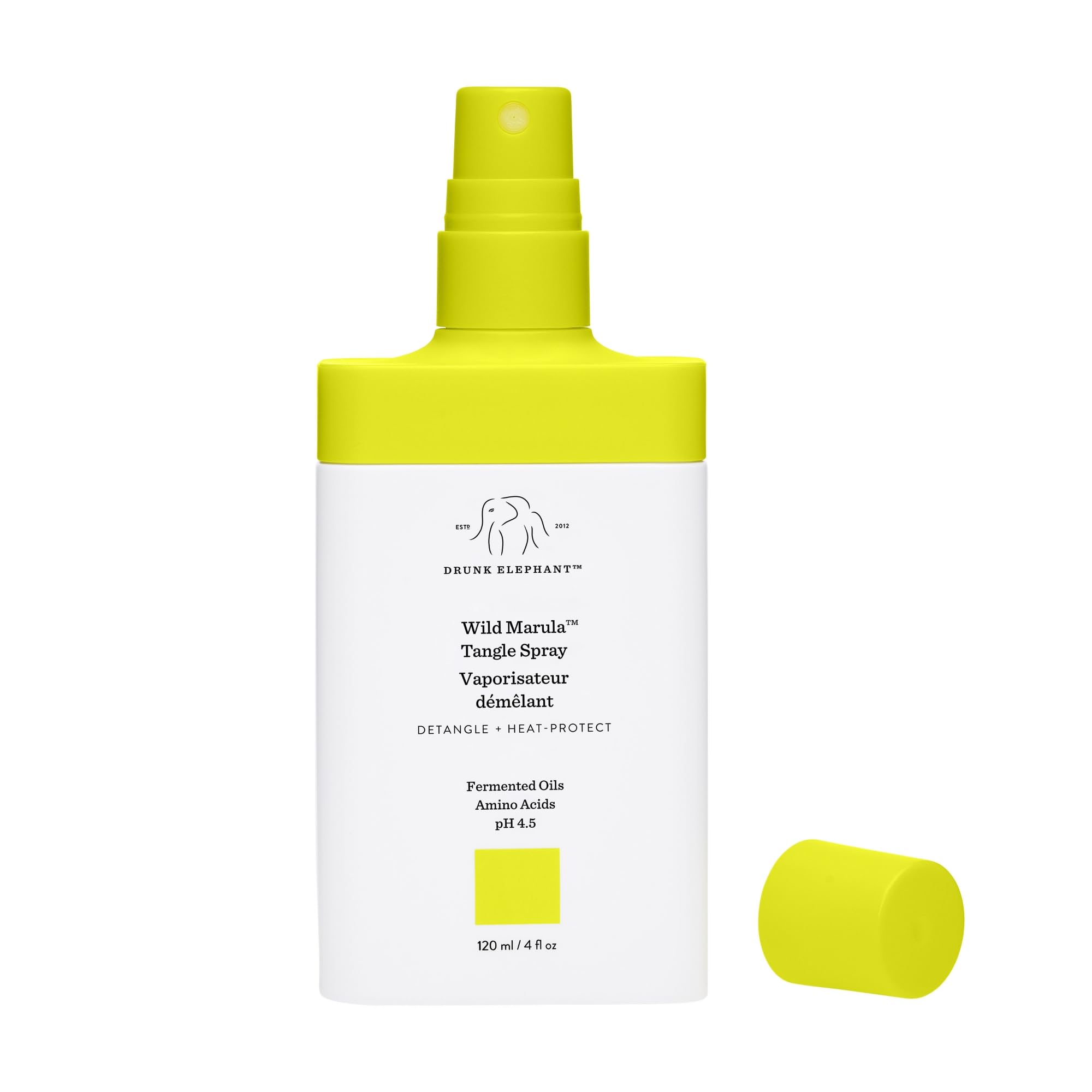 Drunk Elephant Wild Marula Tangle Spray – application sur cheveux humides facilite le démêlage.