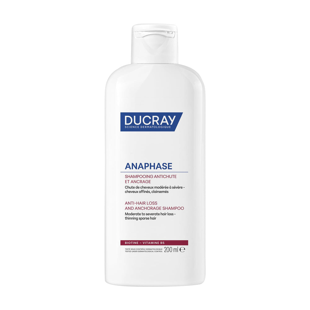 Ducray Anaphase+ bouteille de shampoing renforçant les cheveux et donnant du volume.