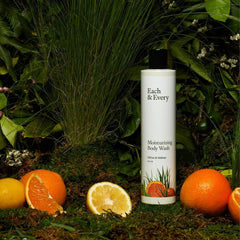 Close-up of citrus and vetiver oils for a refreshing, uplifting shower experience.