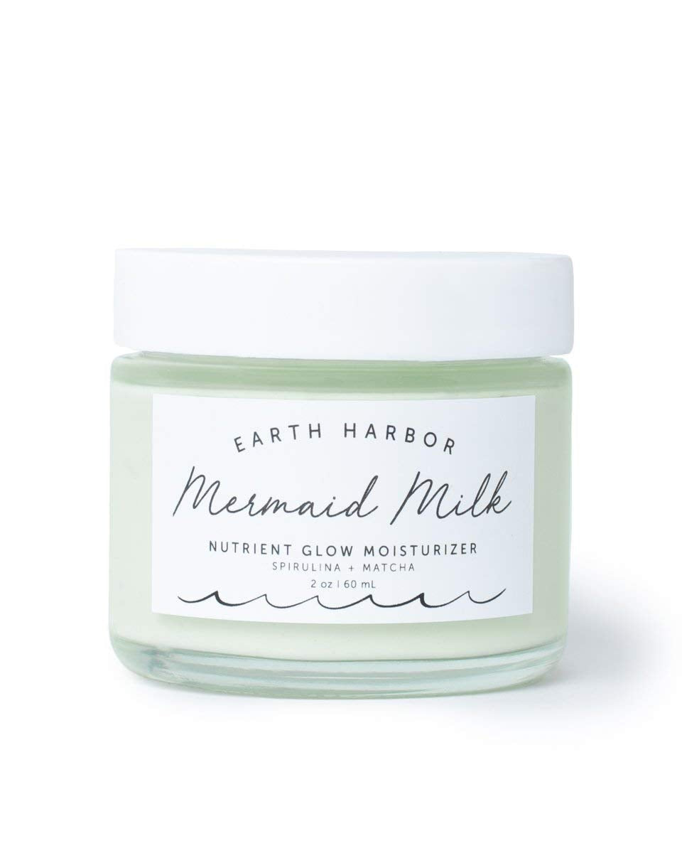 Earth Harbor Mermaid Milk: bouteille et étiquette, hydratation légère prête à l’emploi.