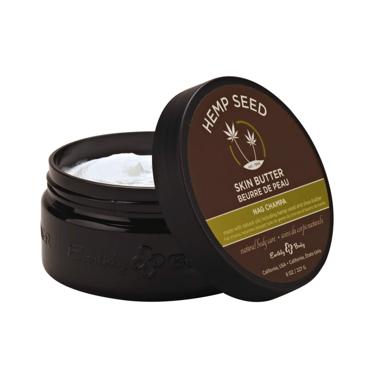 Earthly Body Beurre peau chanvre texture riche pour hydrater les mains.