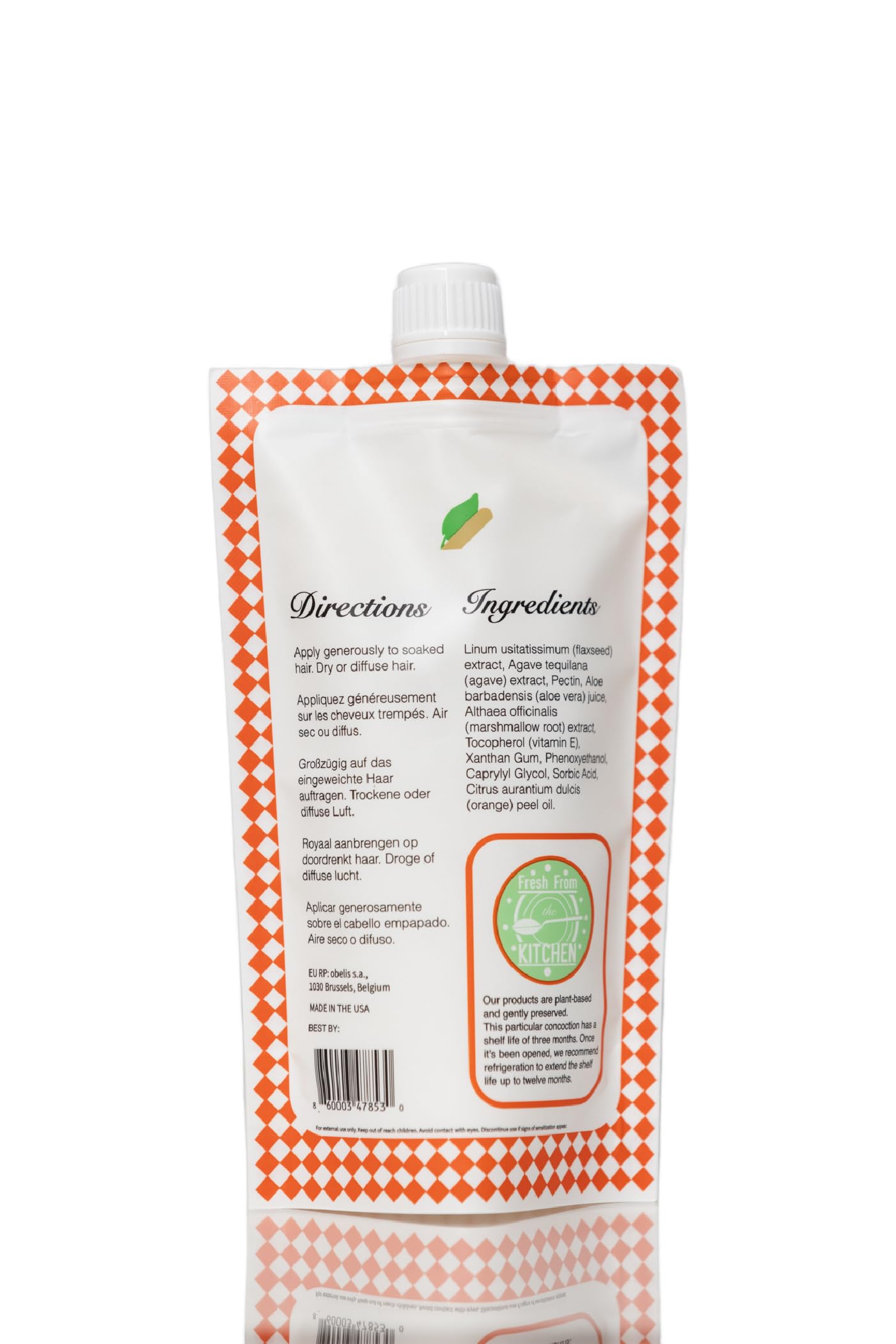 Avant/après montrant des boucles définies et une tenue légère avec Ecoslay Orange Marmalade.