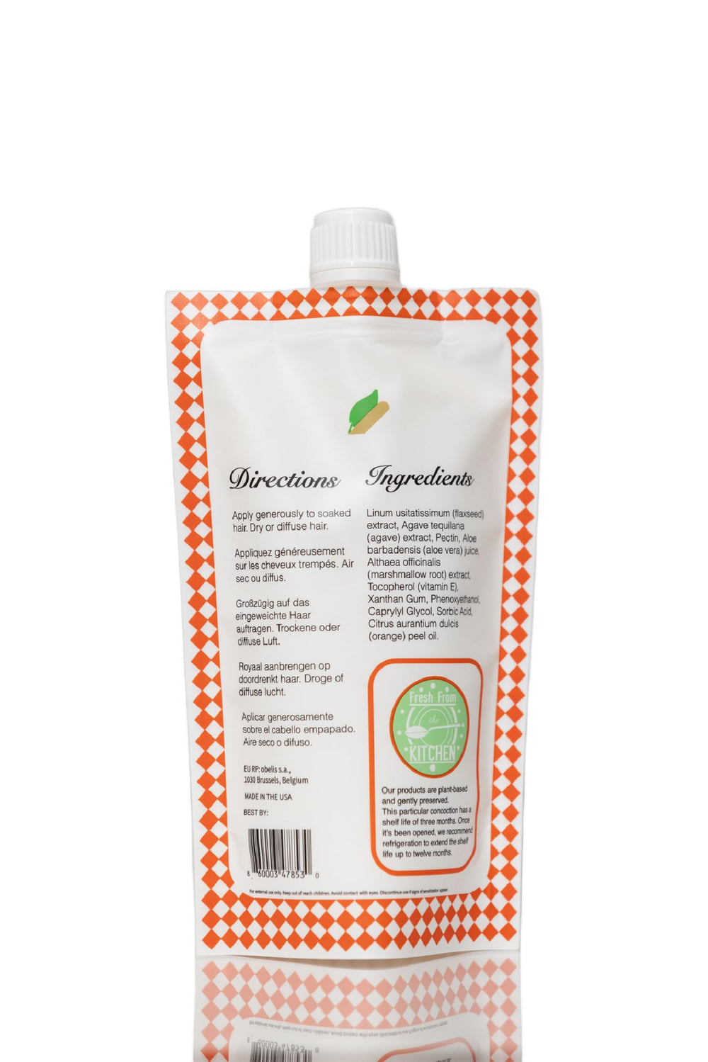 Avant/après montrant des boucles définies et une tenue légère avec Ecoslay Orange Marmalade.
