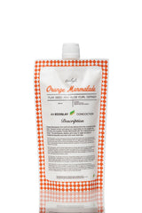 Ecoslay Orange Marmalade, bouteille: définition des boucles et tenue prolongée.