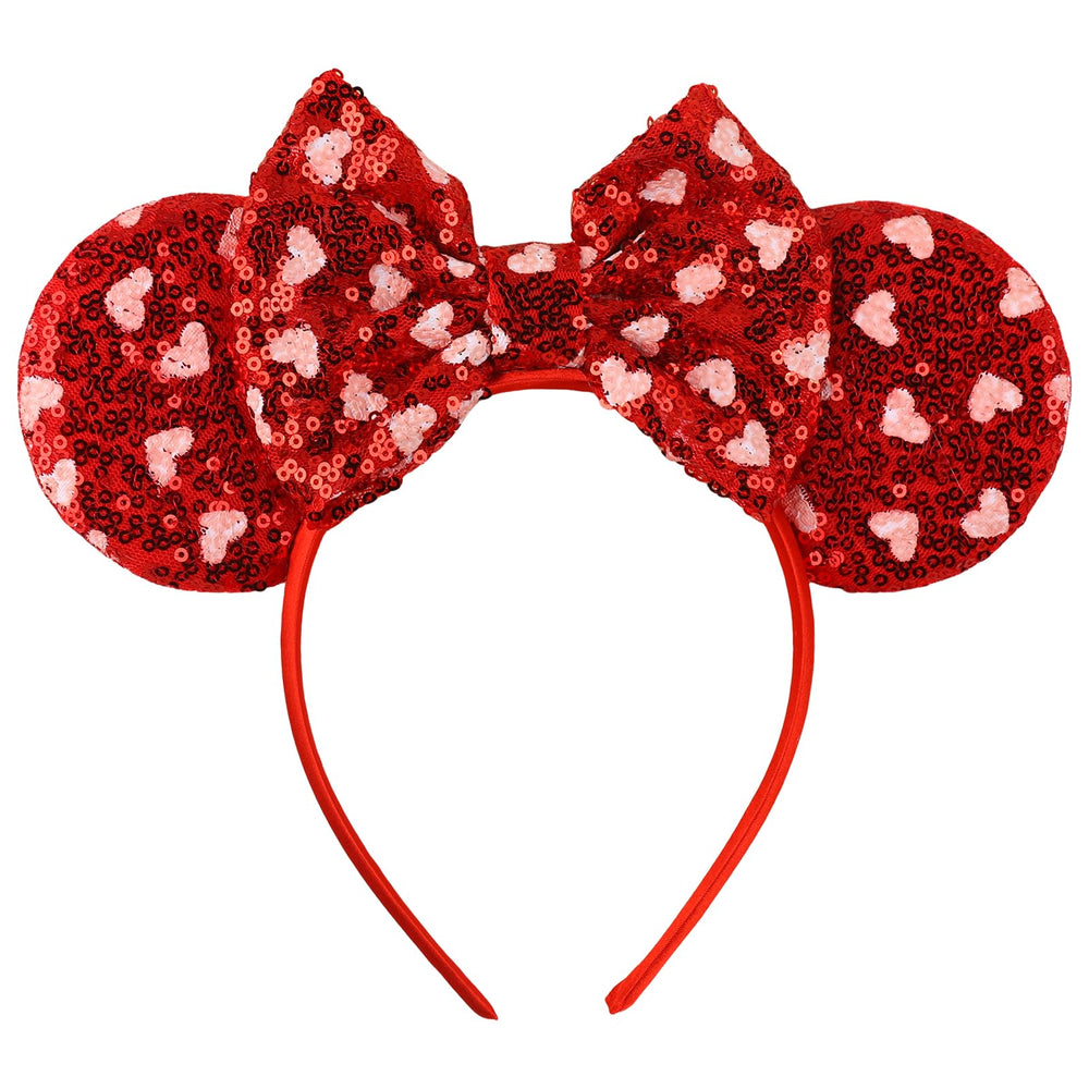 Bandeau Ecuupas avec noeud rouge et paillettes, apparence festive et affirmée.