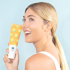 Elizabeth Mott Vitamin C Cleanser foam-lather close-up, refreshing gel-to-foam action.