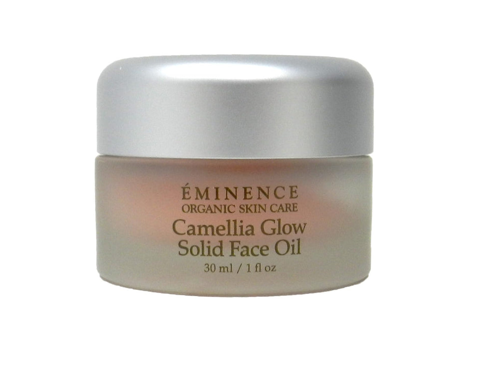 Eminence Camellia Glow huile solide visage sur boîte, présentation pratique.