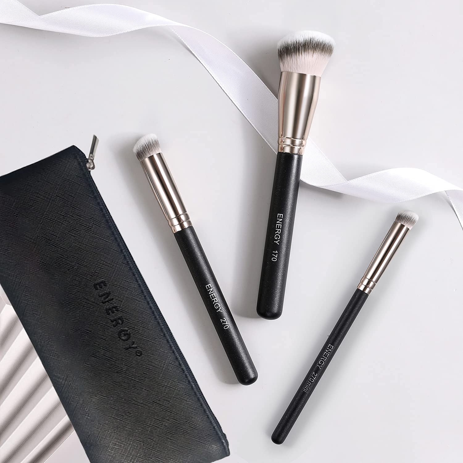 ENERGY Concealer Brush 270 for precise under-eye coverage.