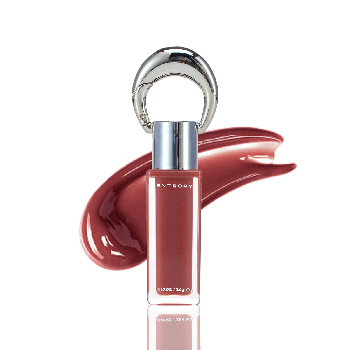 ENTROPY MAKE UP Charme Ambre – bouteille du gloss 2-en-1 prête à briller sur lèvres et joues.