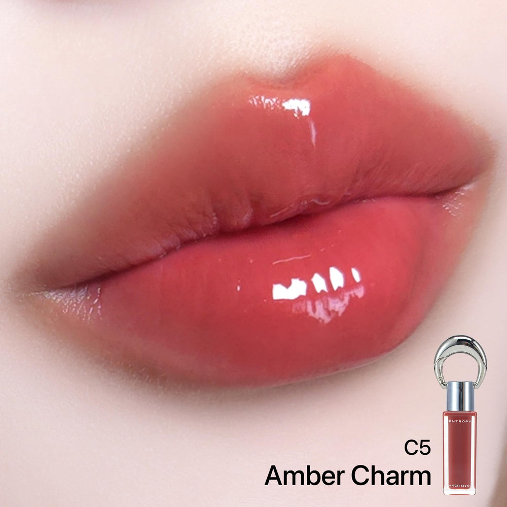 ENTROPY MAKE UP Charme Ambre – fini brillant et hydratant sans sensation collante.