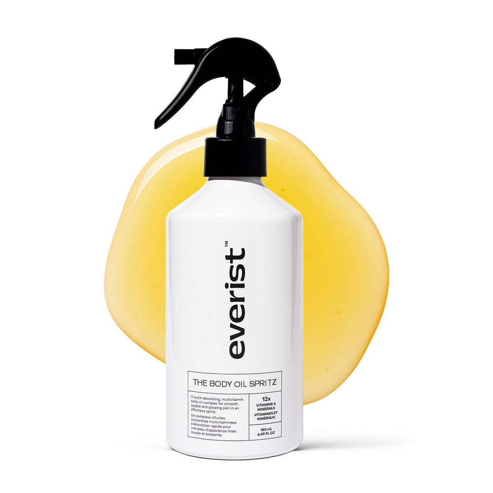 Everist Body Oil Spritz sur la bouteille aluminium, hydratation légère après la douche.