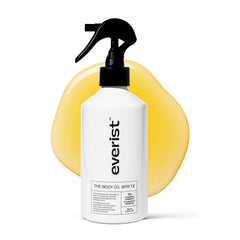 Everist Body Oil Spritz sur la bouteille aluminium, hydratation légère après la douche.