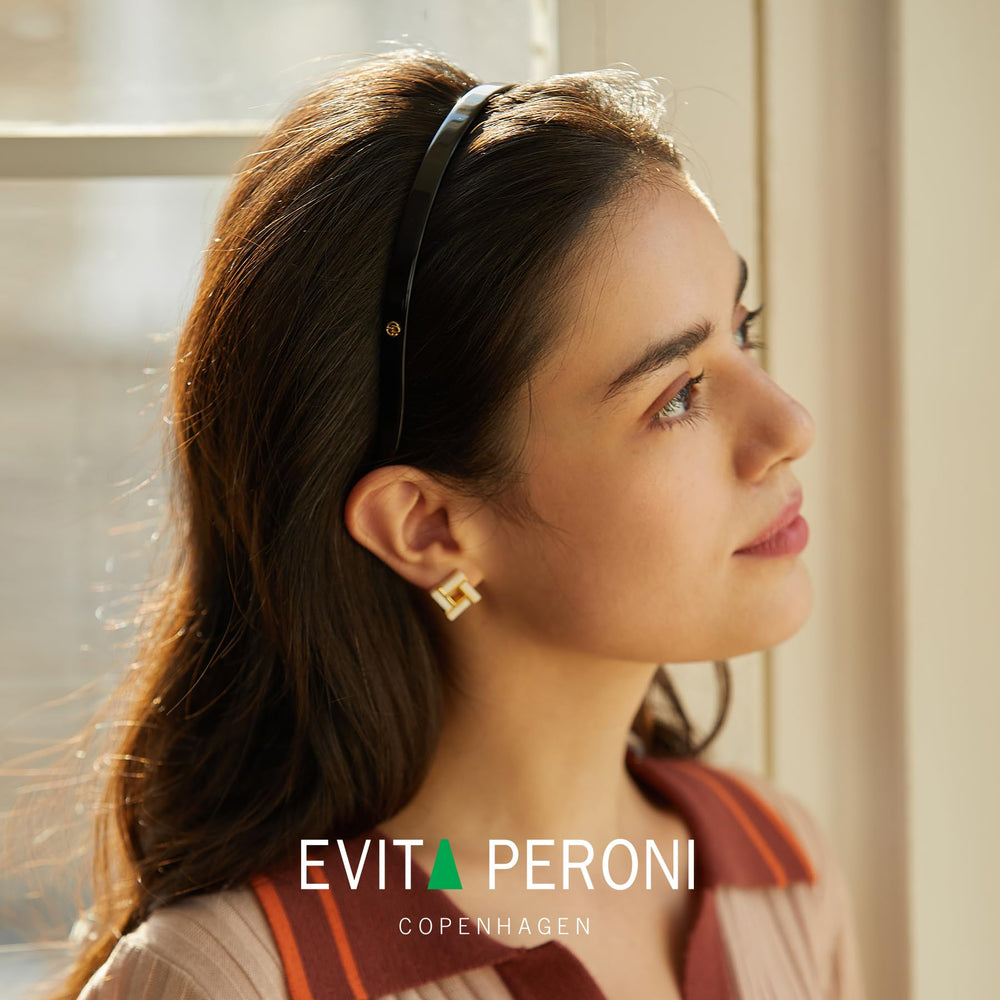 Evita Peroni, coffret cadeau premium avec pochette velours.