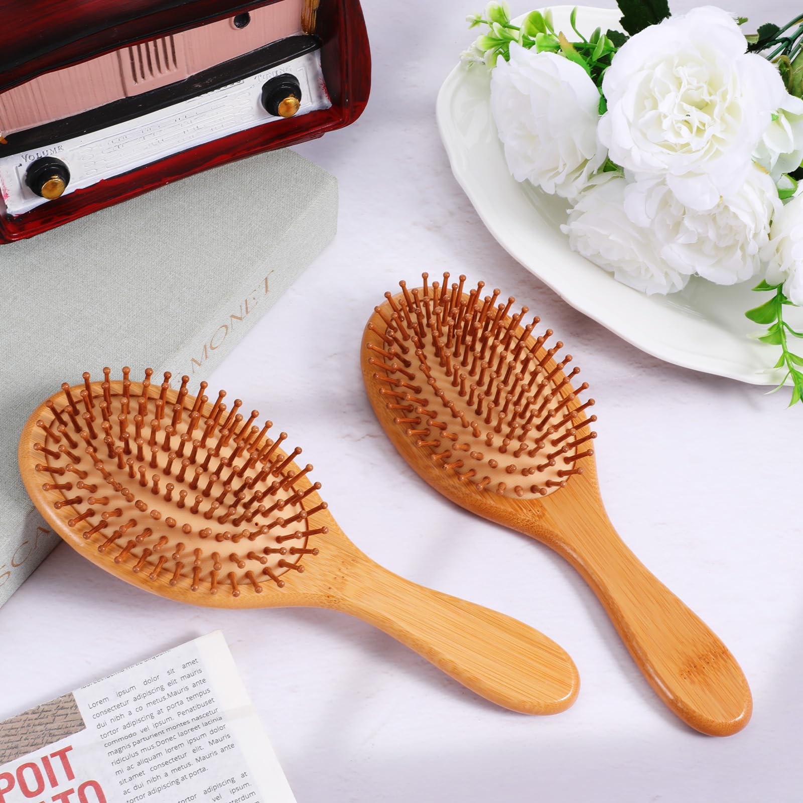 Exclaith brosse-cheveux-bambou-tetes-arrondies : picots pour massage du cuir chevelu.