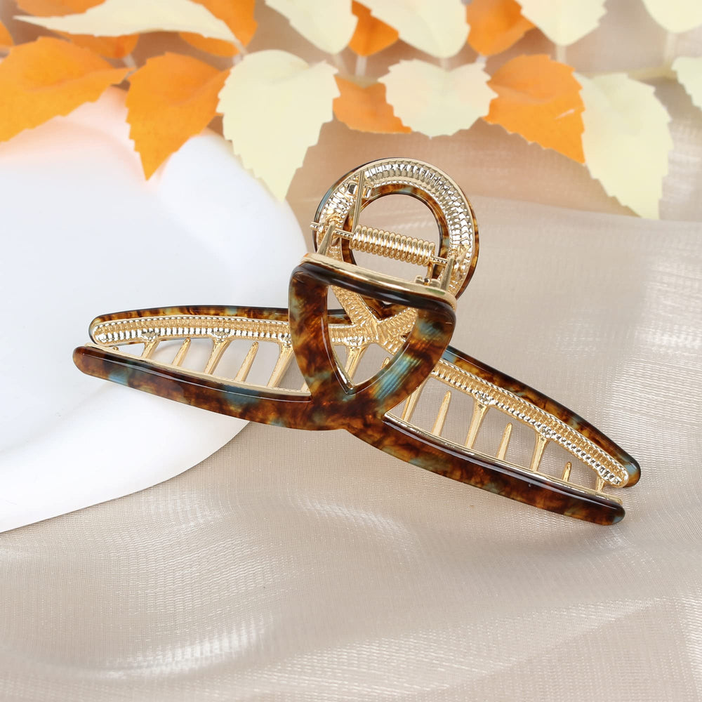 Barrettes FAELBATY papillon acétate brun-vert pour un look élégant.