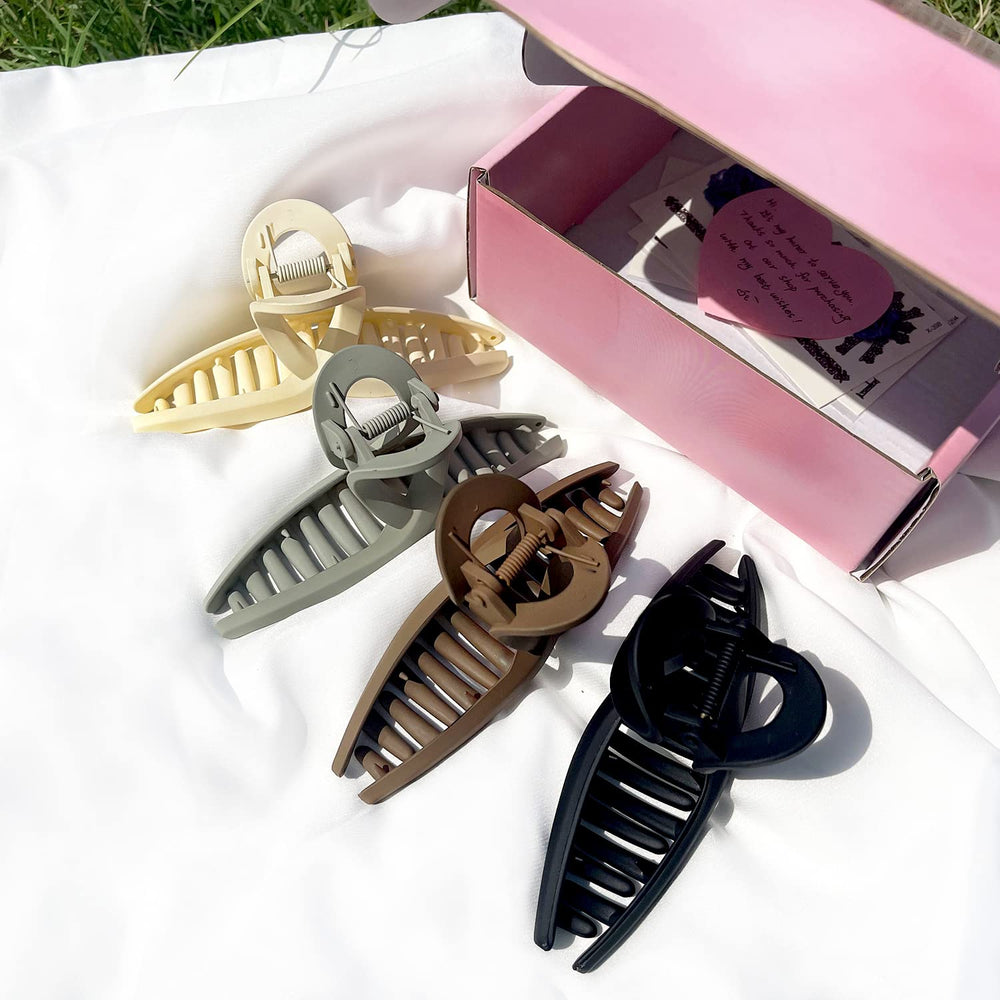 FAELBATY pince papillon noir: style élégant et prise ferme pour chignon rapide.
