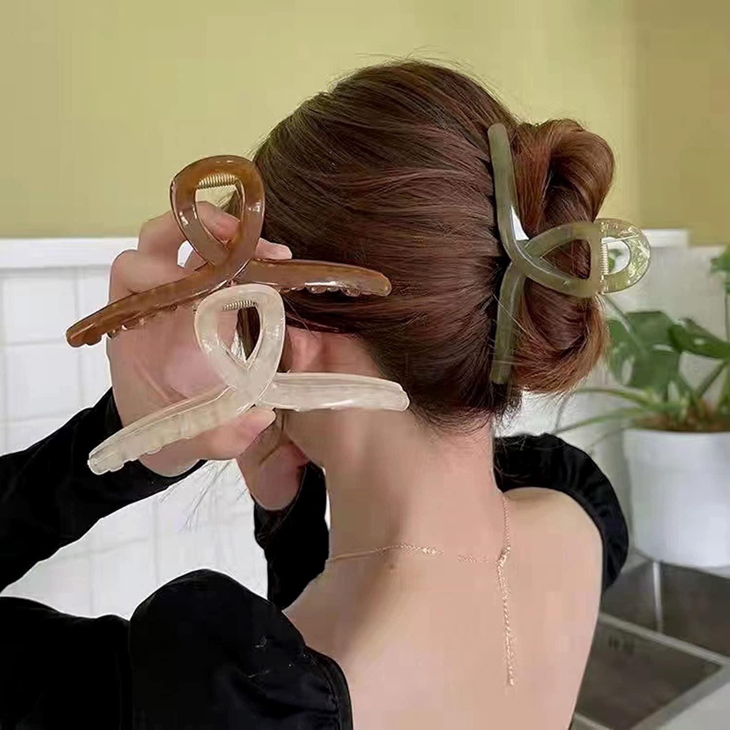 FAELBATY clip jelly papillon vert jade, allure élégante pour toutes les coiffures.