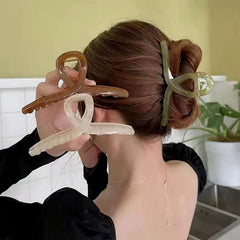 FAELBATY clip jelly papillon vert jade, allure élégante pour toutes les coiffures.