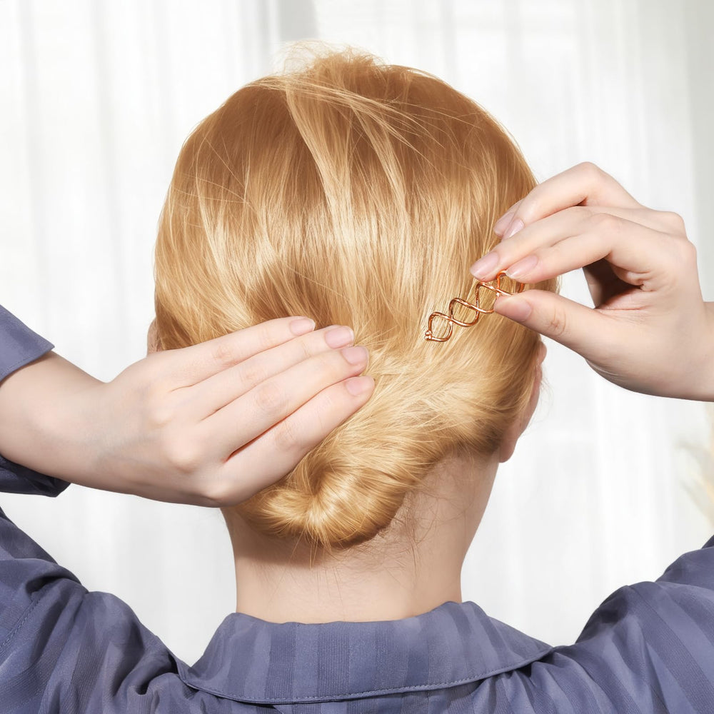 Accessoire cheveux compact Fandamei spiralé, idéal pour le voyage.