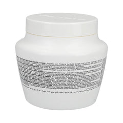 Fanola masque réparateur, texture crème, offre une hydratation nourrissante pour cheveux secs.