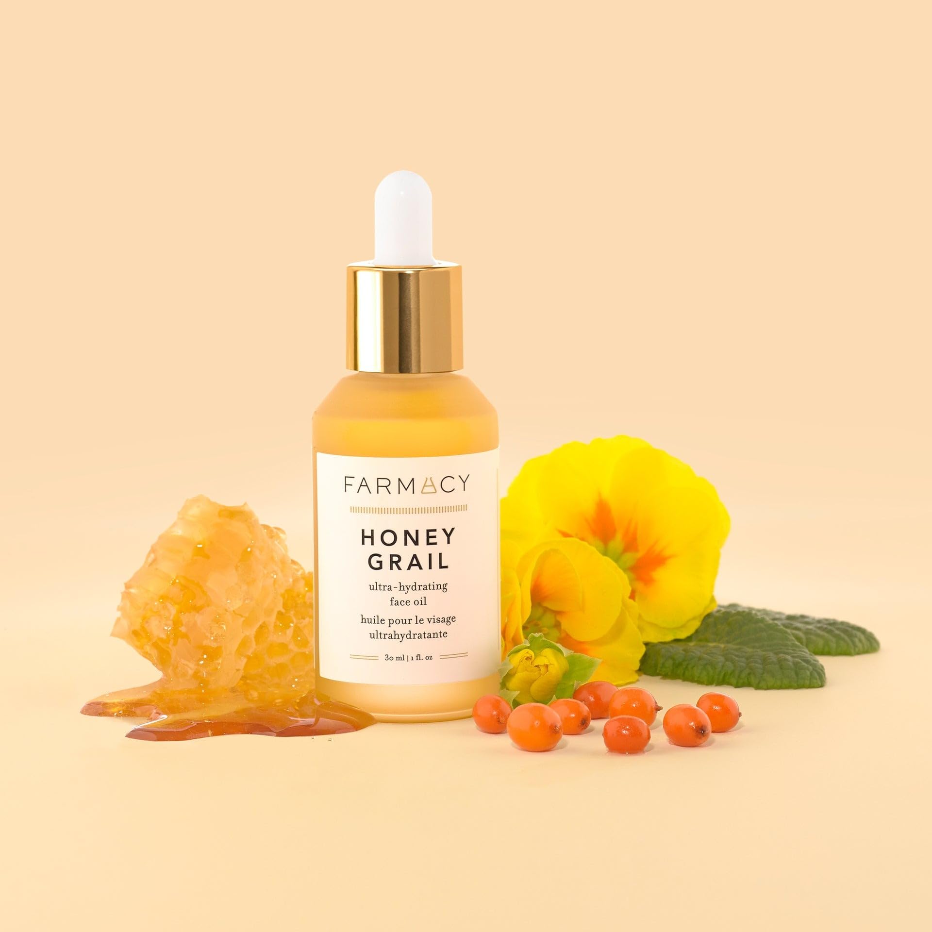 Farmacy Honey Grail huile-de-rose-musquee pour cheveux brillants et hydratés.