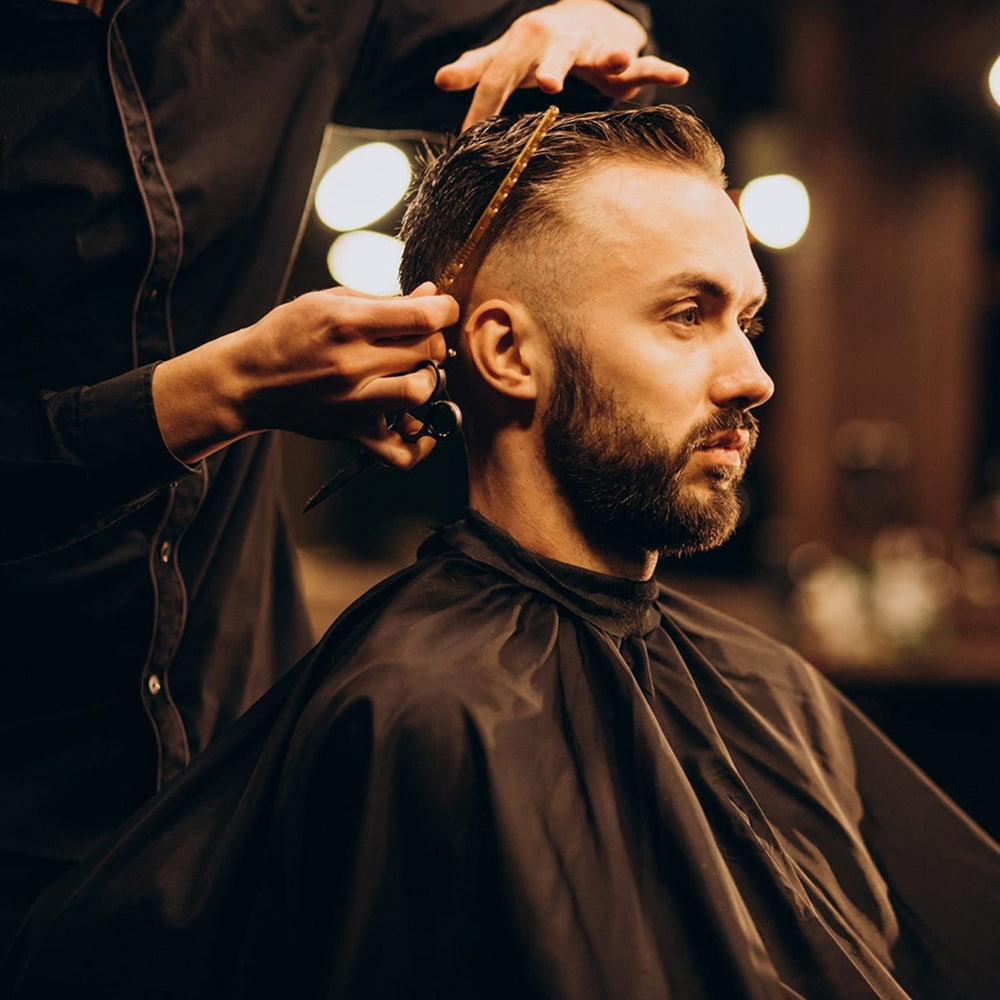 Fcysy cape barber noir: protège les vêtements et facilite les mouvements.