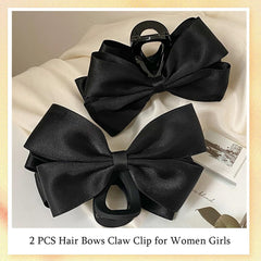 Pinces-cheveux nœud grand-format FDBJulyy noir brillant maintiennent les cheveux épais.