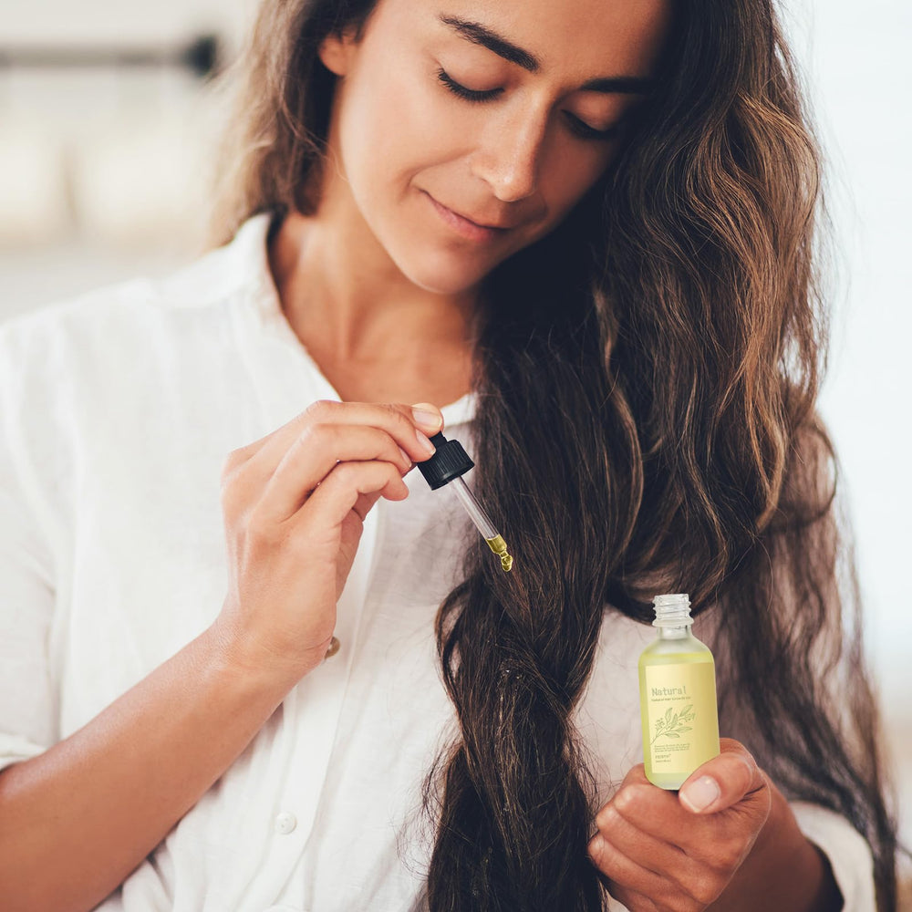 FEIBTH applying 2-3 drops to scalp for easy daily nourishment.