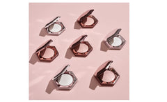 Fenty Beauty Diamond Bomb teinte rose rosé pour visage et corps, effet brillant.