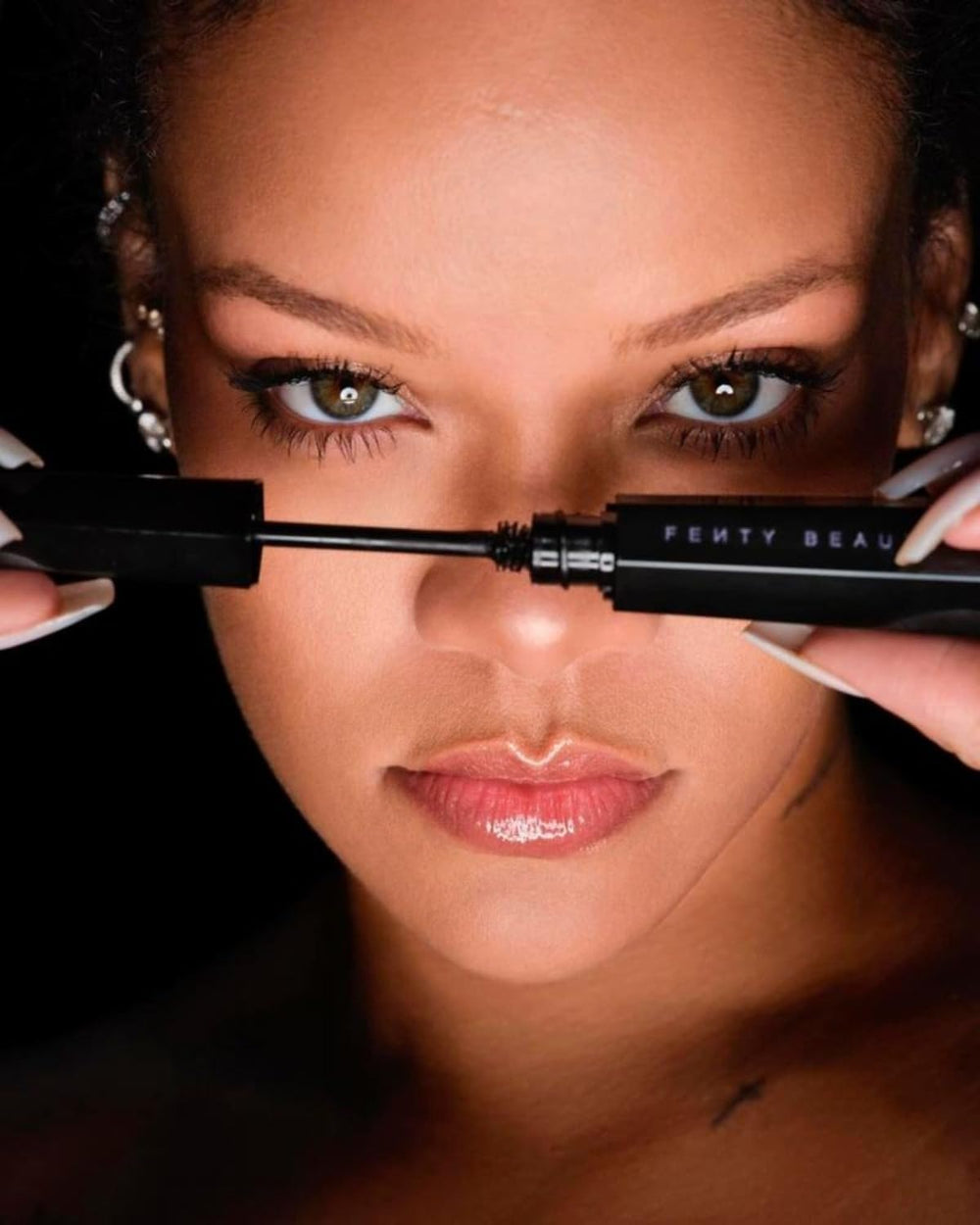 Fenty Beauty deluxe sample swatch on skin hints at shade range options.