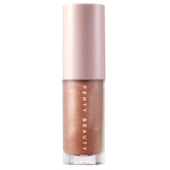 Gloss Bomb mini-bouteille FENTY BEAUTY prête pour retouches et brillance légère.