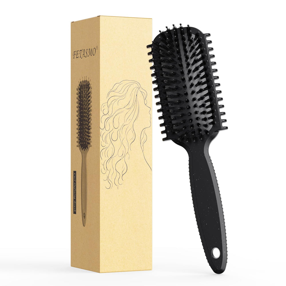Brosse Fetasma pour boucles : définition précise et tiraillement réduit.