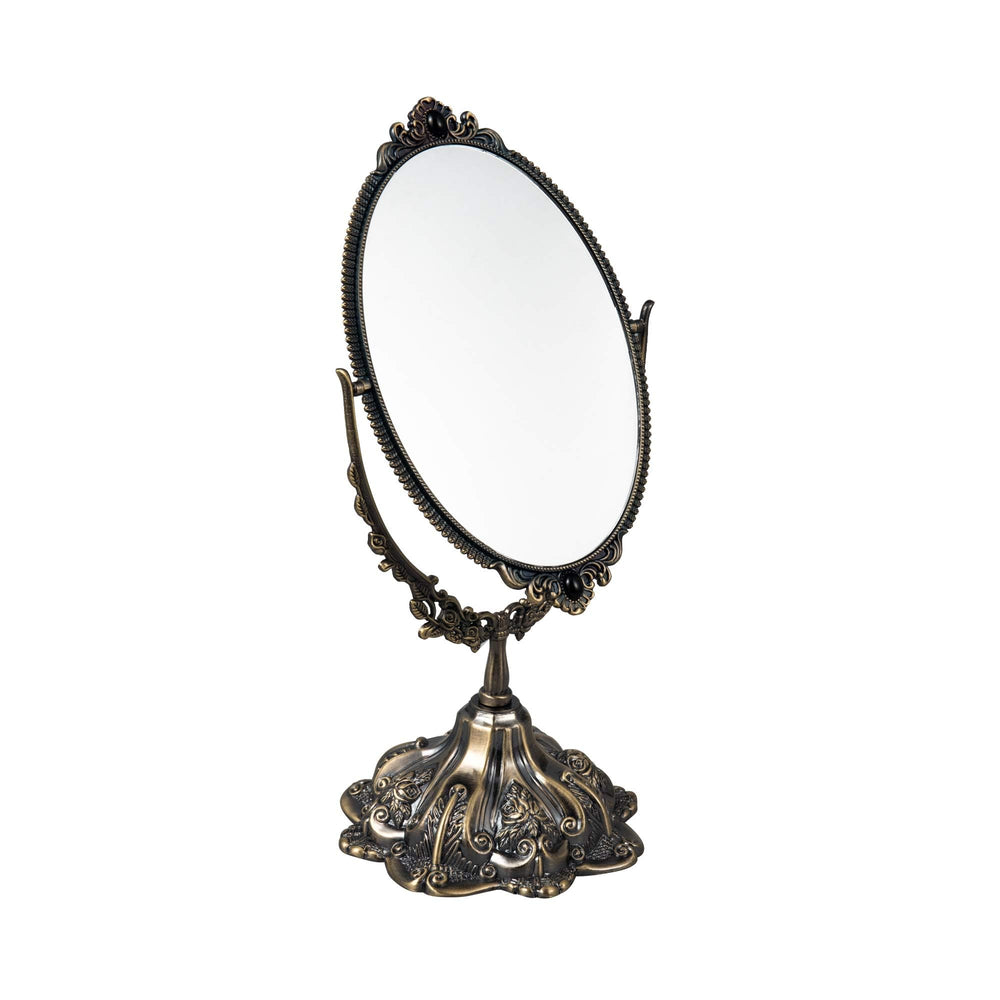 Miroir Feyarl vintage oval sur table avec cadre floral, élégant et durable.