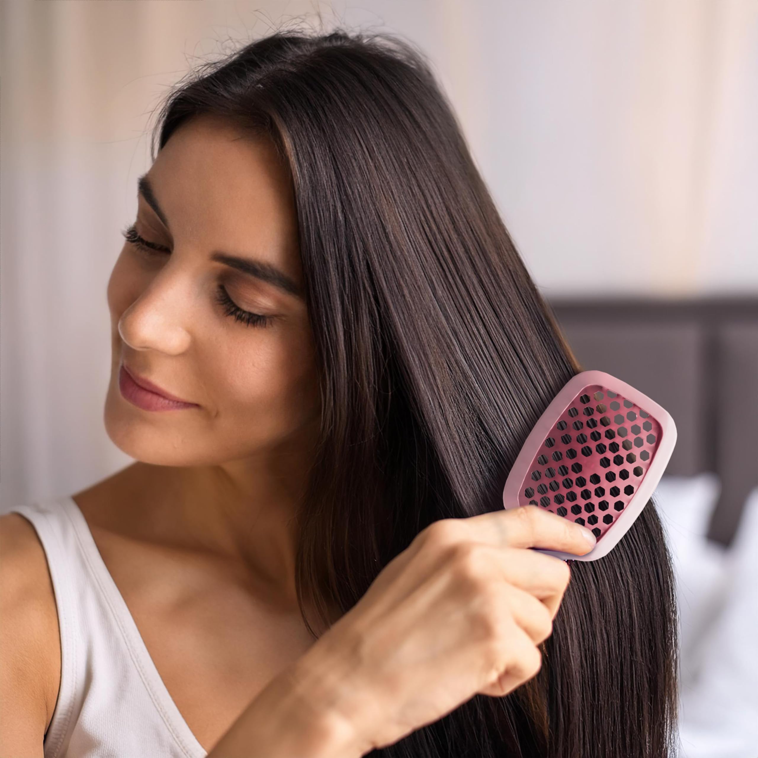 UNbrush mini de FHI Heat: brins longs et courts pour détangler en profondeur.