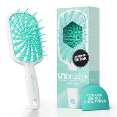 FHI Heat UNbrush Plus avec 84 soies UltraFlex pour démêler en douceur les boucles fragiles.
