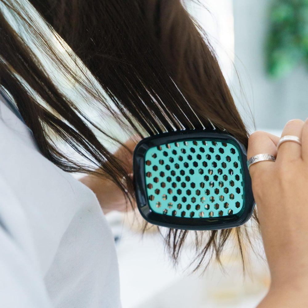 UNbrush adaptée à tous types de cheveux et à toute la famille