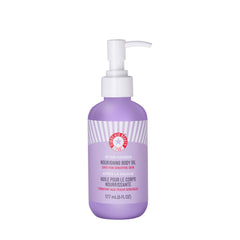 First Aid Beauty huile corps apres-douche, bouteille élégante et hydratation rapide.