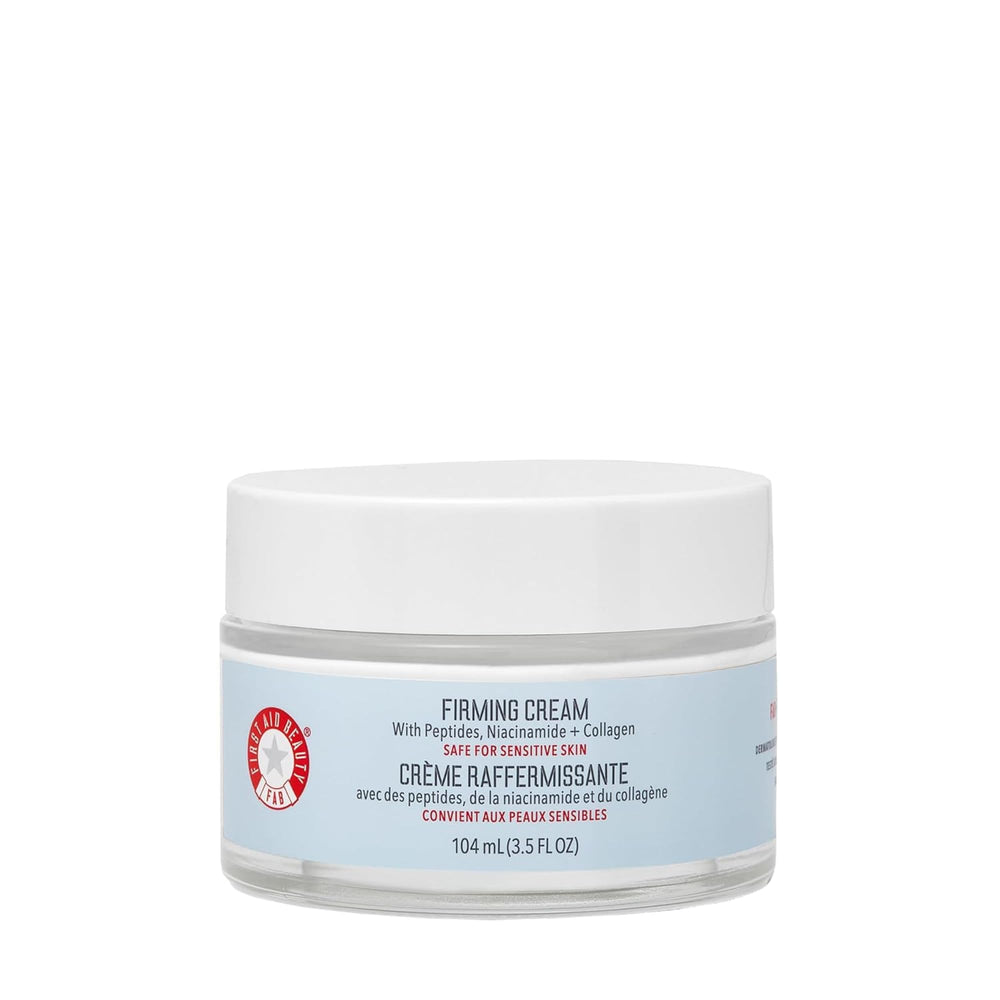First Aid Beauty Crème fermante Ultra Repair sur bouteille, hydratation luxueuse et raffermissante.