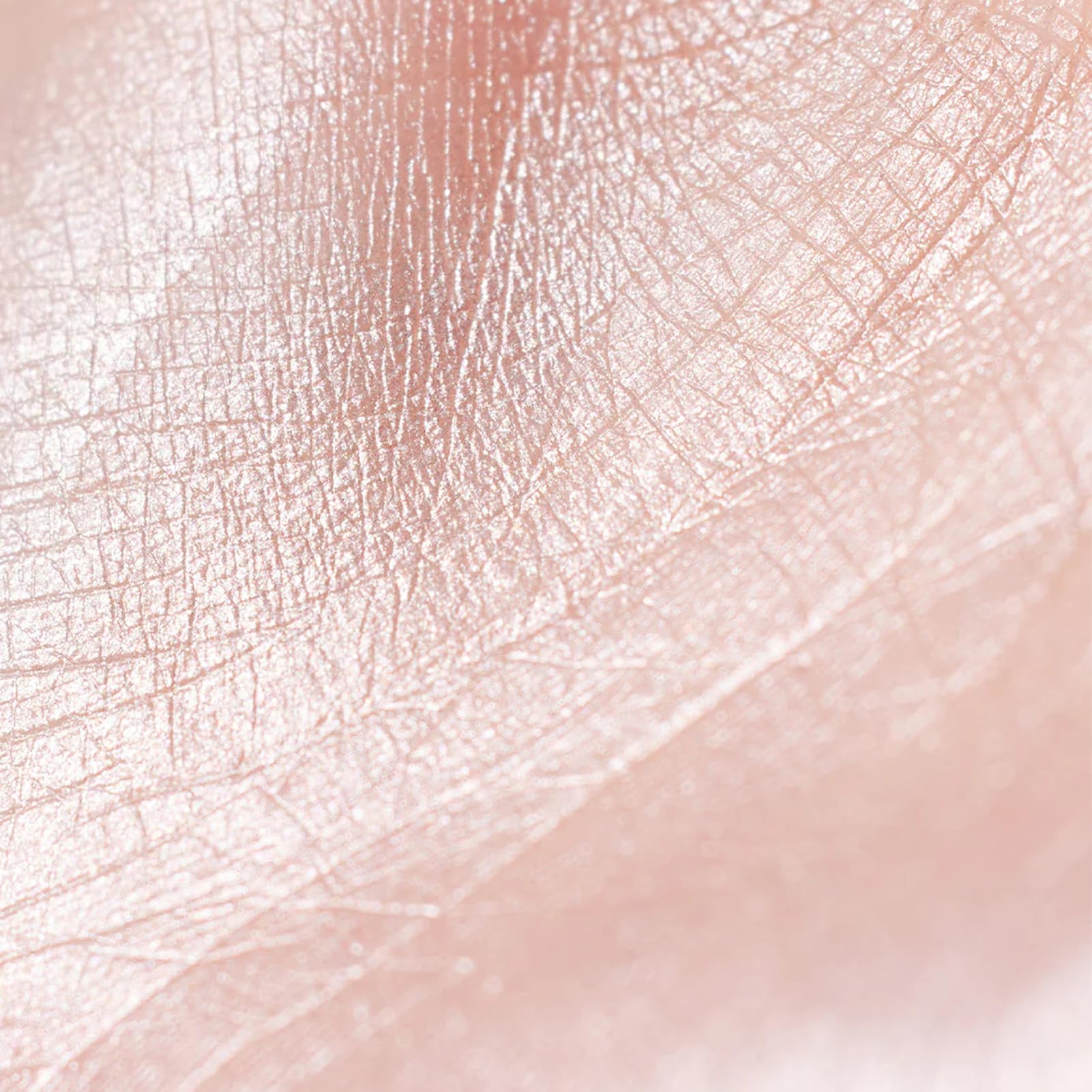 Flower Knows Illuminateur liquide rose lilas menthe pour un éclat frais sur le visage.