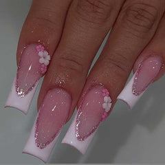 Ongles Foccna longs et brillants avec strass pour une manucure chic durable.