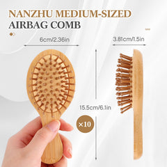 Brosse FoldTier mini oval portable idéale pour le sac et les déplacements.