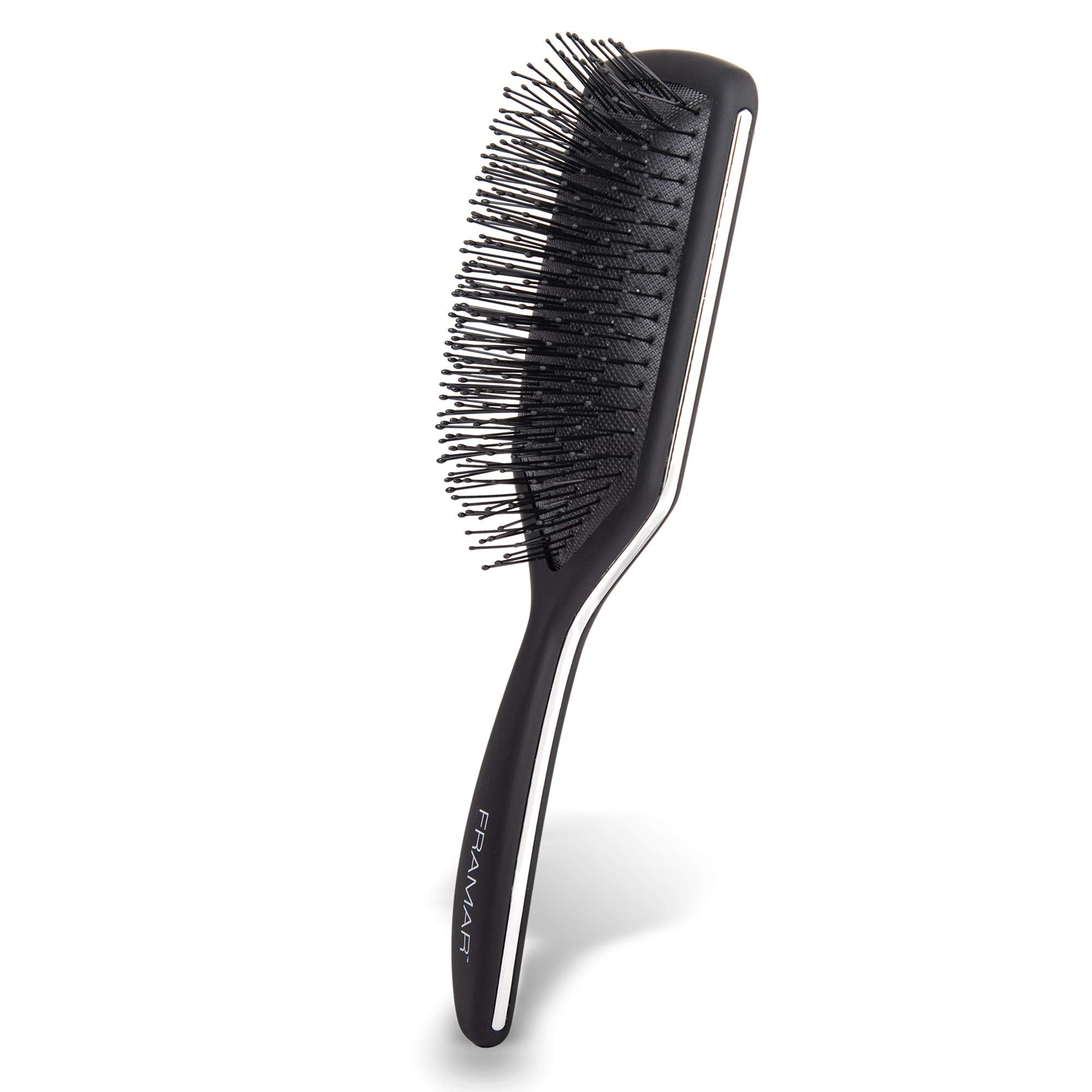 Brosse FRAMAR palette noire démêlage efficace pour cheveux épais et bouclés.