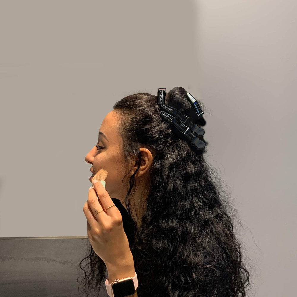 FRAMAR clips-coiffure noirs avec ressort elastique garantissant durabilité.