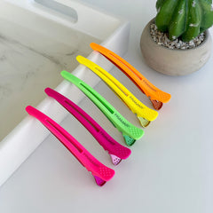 Framar Neon Creaseless Clips – maintien précis lors du sectionnement des cheveux sans marque.