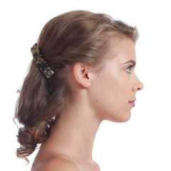 Barrette Fsmiling en acétate ecaille de tortue, allure polyvalente et sécurisée.