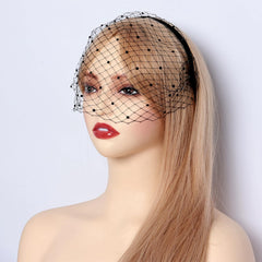Fumwase voile-noir accessoire chic pour mariage et réceptions.
