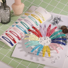 Pince Funtopia coloris lumineux pour sublimer les coiffures quotidiennes.