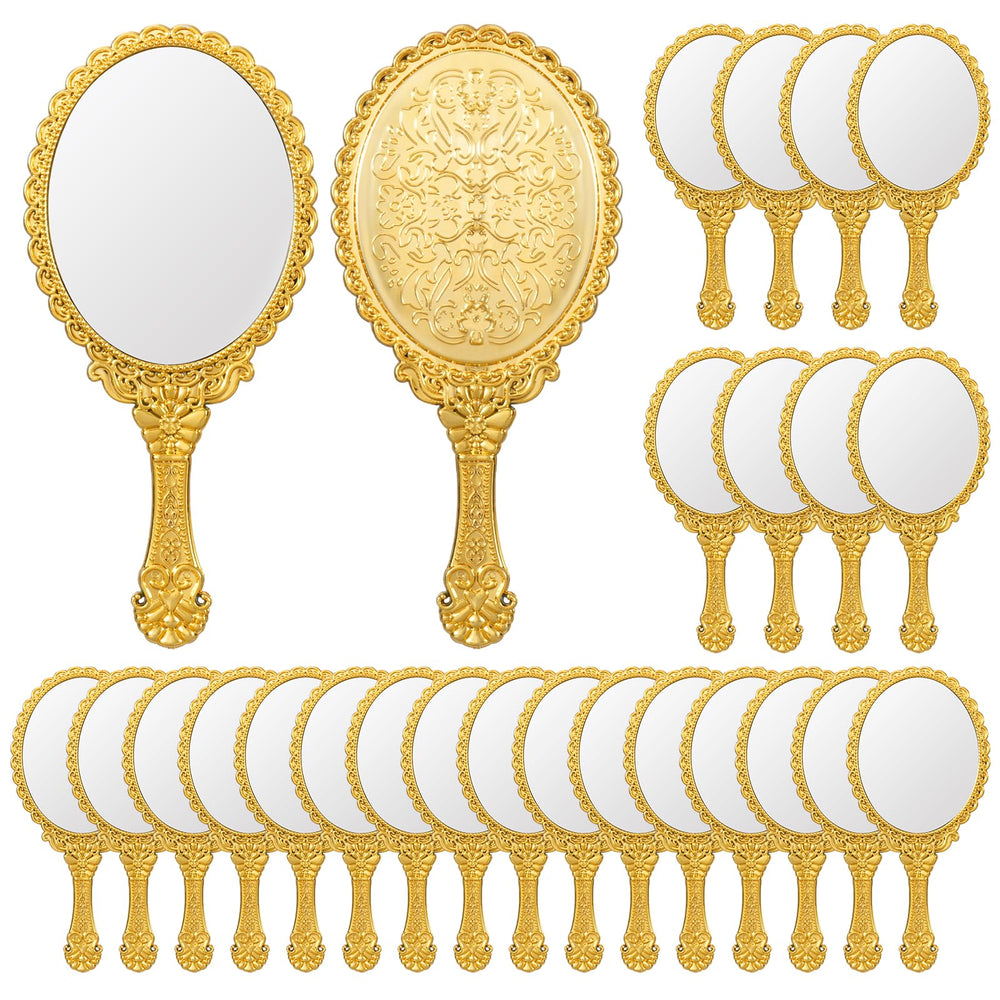 Miroir à main vintage FUPMILPHRANX, décor fleurs dorées, utile pour retouches maquillage en déplacement.