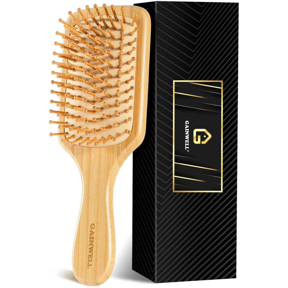 Gainwell brosse cheveux bambou avec massage cuir chevelu pour une sensation apaisante.